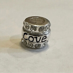 Solid Sterling silver stamped Pandora style bead - “Love” with rhinestones